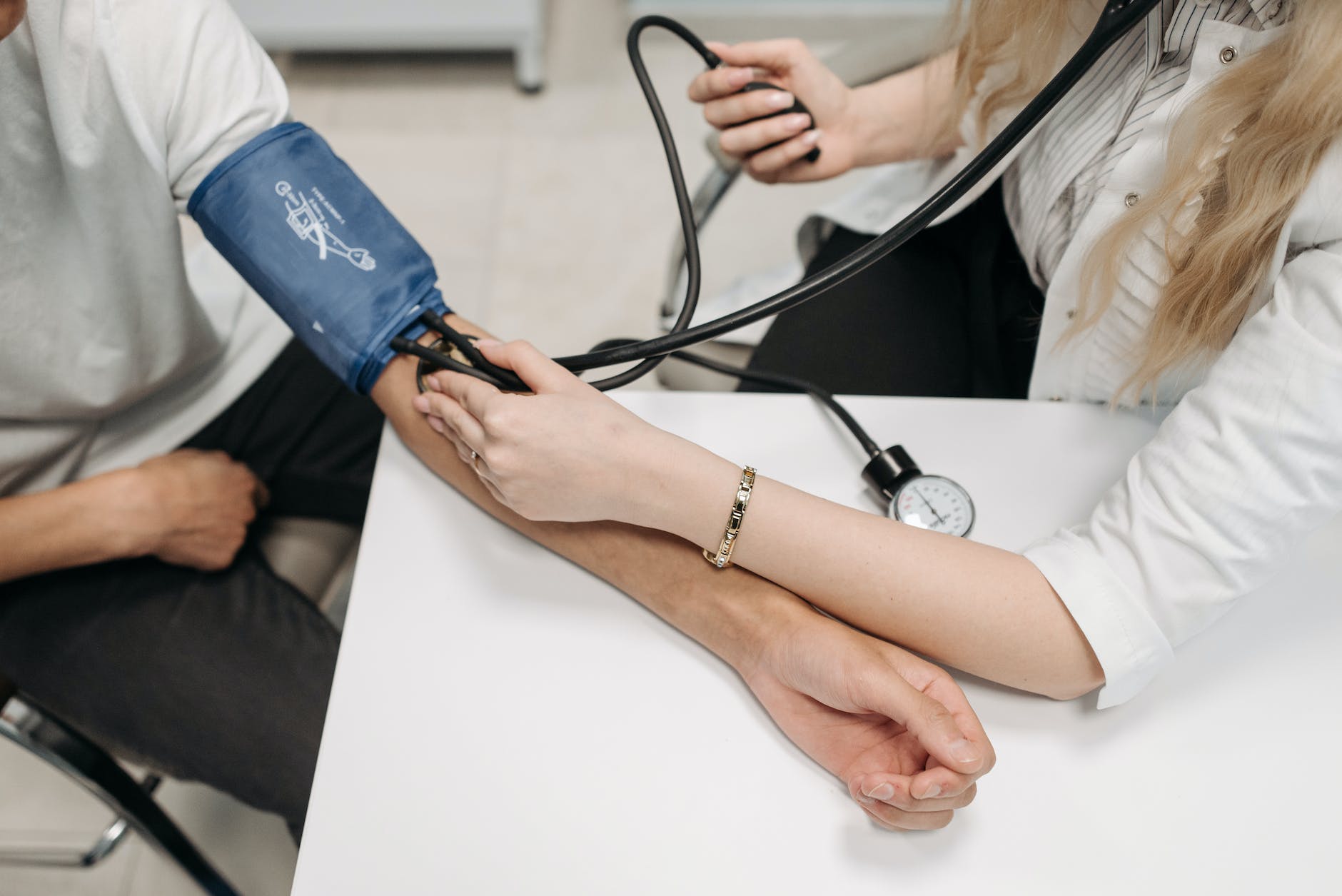 measuring a patients blood pressure 